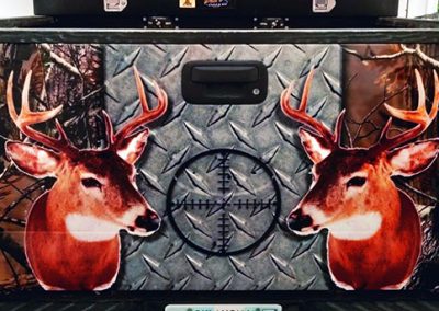 Deer and target tailgate wrap with american flag.